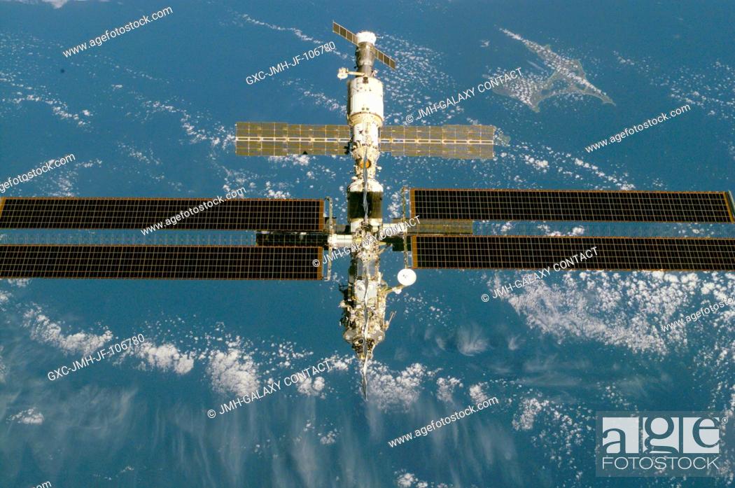 Stock Photo: This high-angle view is one of a series of digital still camera photographs showing the International Space Station (ISS) during a fly-around by the Space.