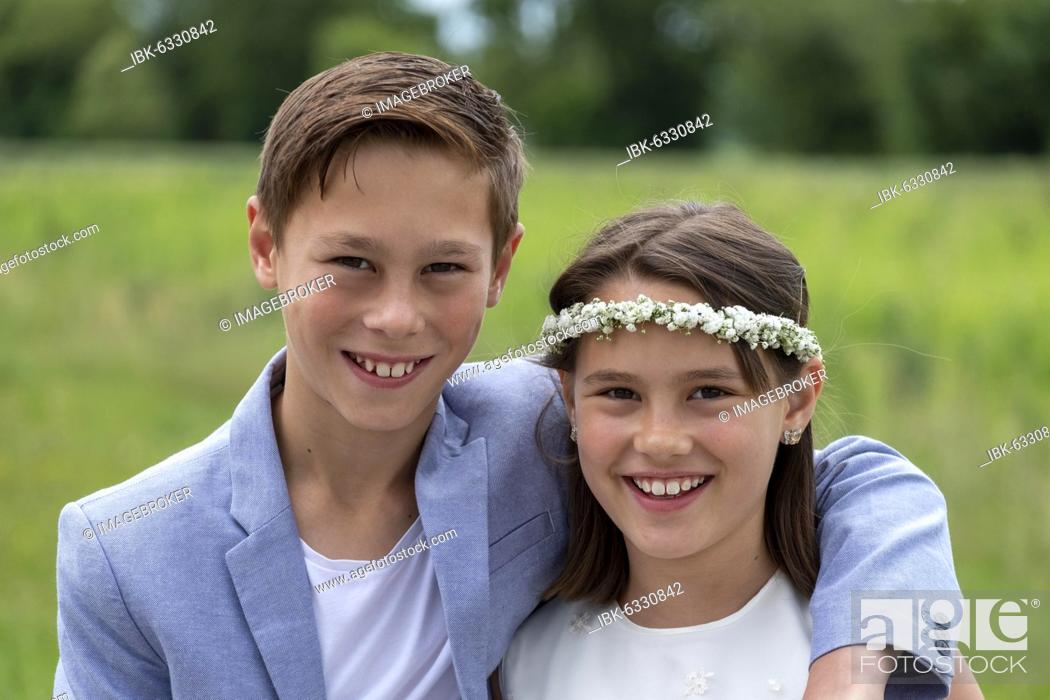 Stock Photo: Brother and sister festively dressed, girl with flower wreath in her hair, Upper Bavaria, Bavaria, Germany, Europe.