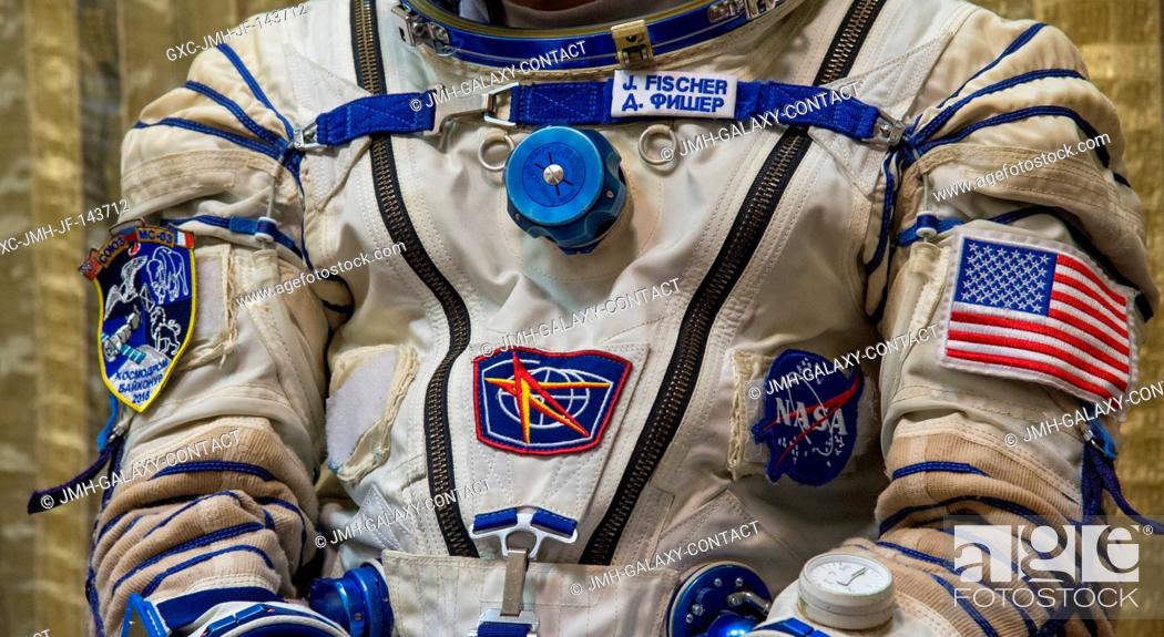 Stock Photo: Expedition 50 backup crew member, NASA astronaut Jack Fischer, dons his Sokol suit ahead of his Soyuz qualification exams with Russian cosmonaut Fyodor.