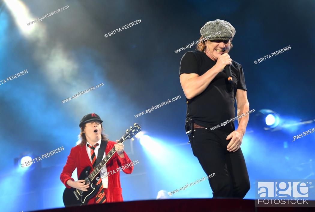 Singer Brian Johnson (R) and guitarist Angus Young of Australian rock band AC/DC perform on Stock Photo, Picture And Image. Pic. PAH-59526826 | agefotostock
