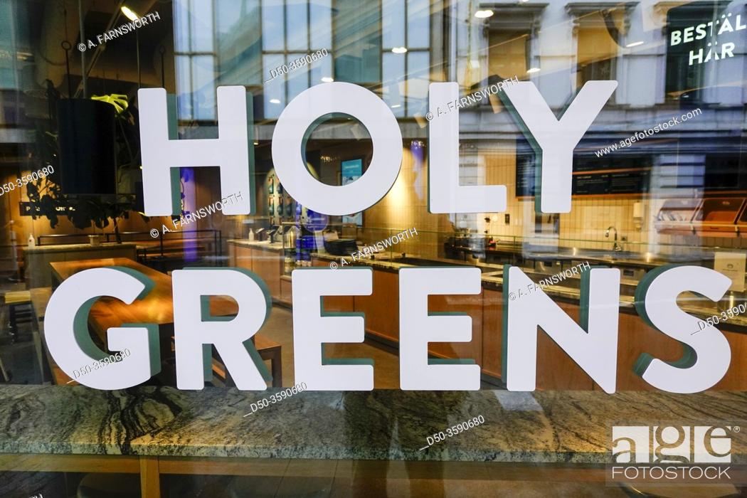 Stock Photo: Gothenburg, Sweden A vegetarian restaurant window with the text Holy Greens.