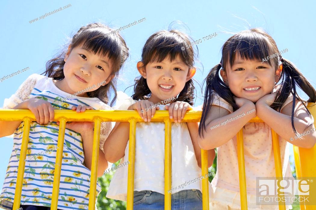Stock Photo: Japanese kids in a city park.