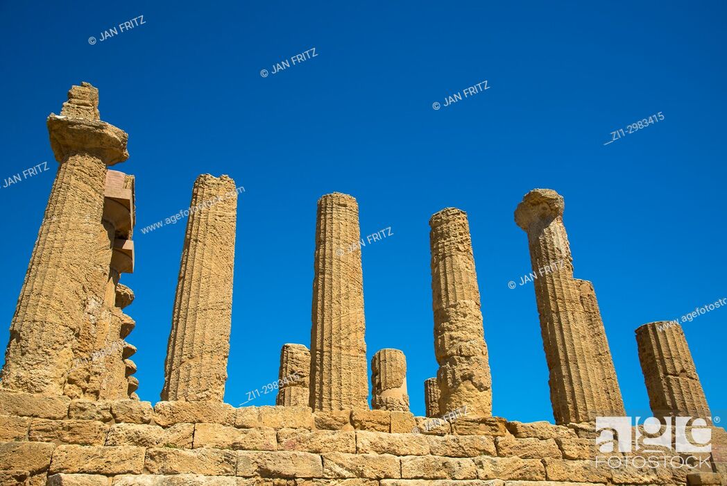 Stock Photo: Pilars at the ruins of Temple of Juno in the Valley of the Temples, Agrigento, Sicily, Italy.