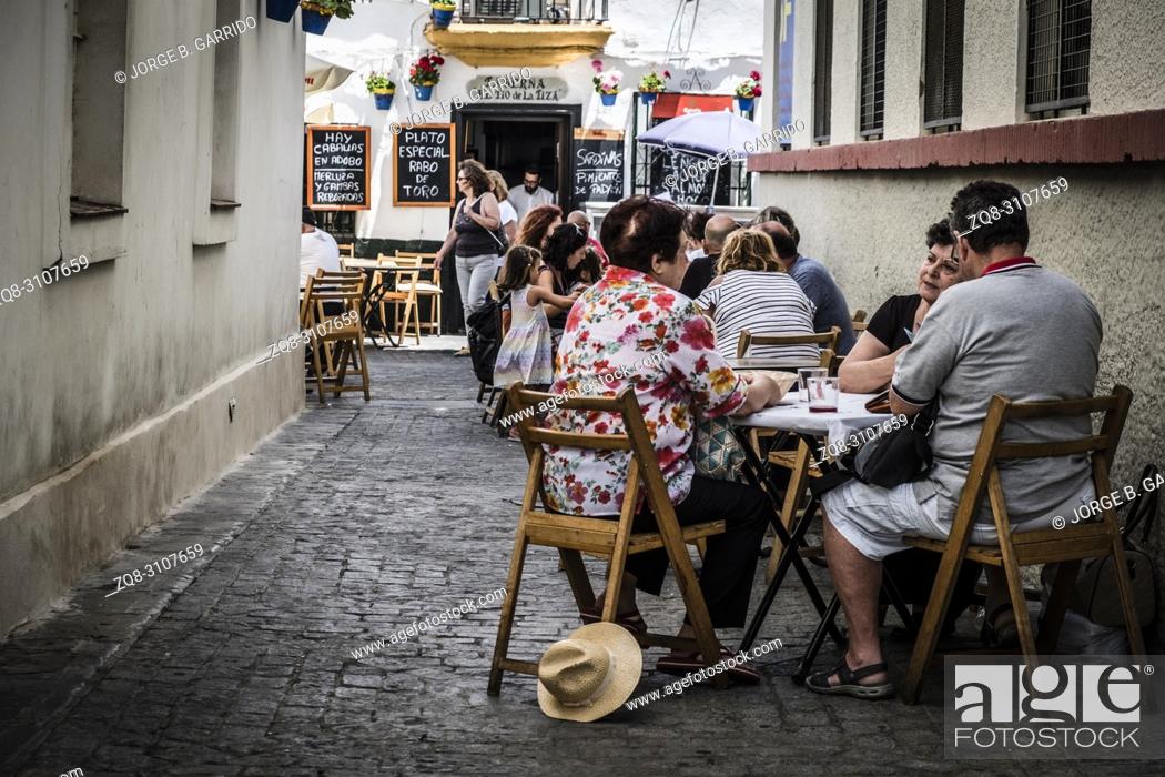Stock Photo: Tourists and locals at the beautiful and historic streets of Cadiz, Spain.