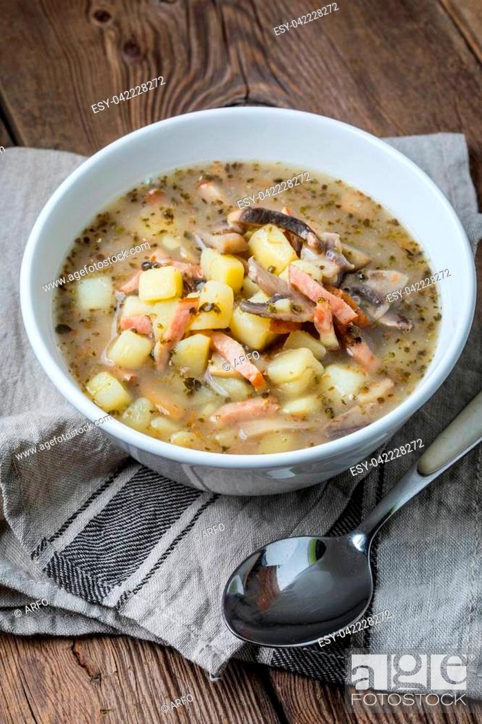 Stock Photo: Sour rye soup with potatoes, mushrooms and smoked meat.
