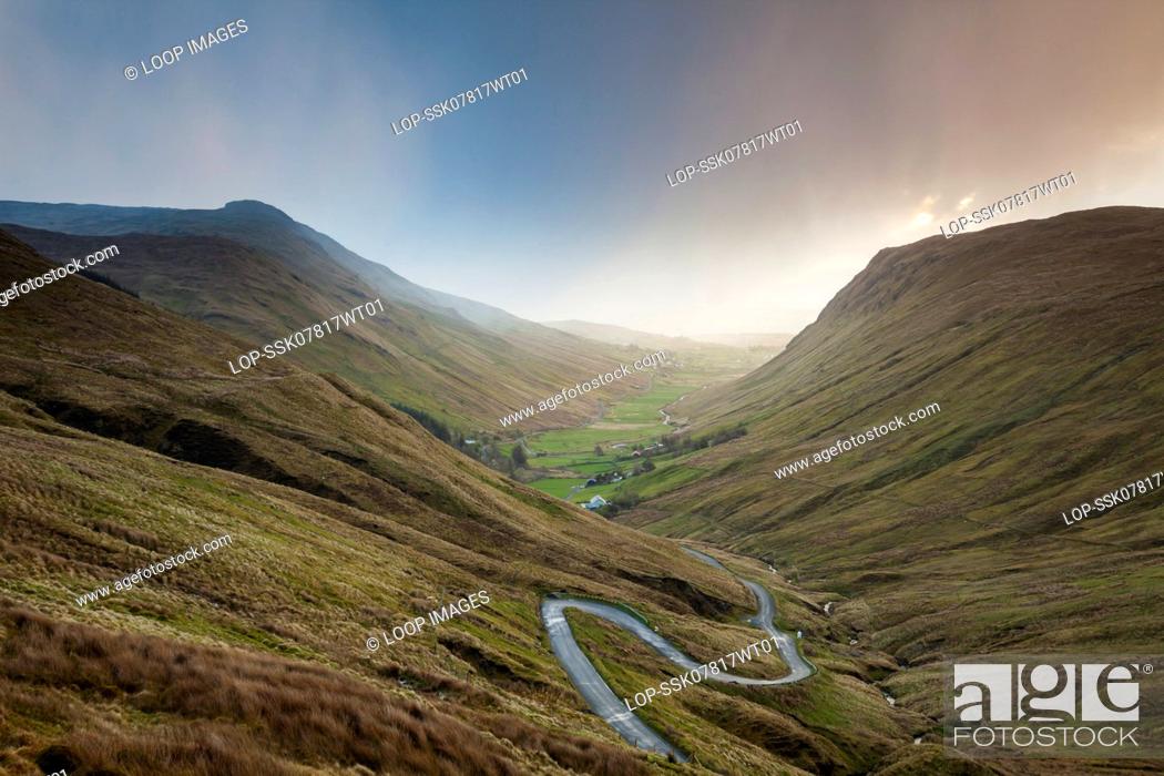 Stock Photo: Showery dawn at Glengesh Pass in county Donegal.