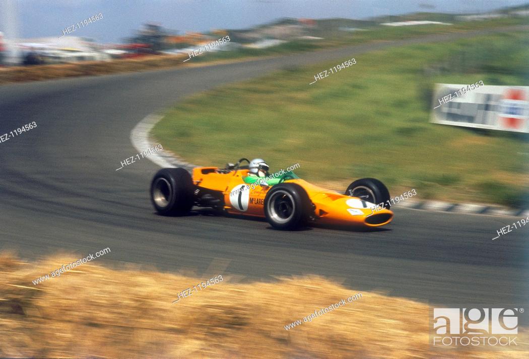 Stock Photo: Denny Hulme, Dutch Grand Prix, Zandvoort, 1968. Hulme steers his McLaren through a corner. He retired from the race after 10 laps with ignition trouble.