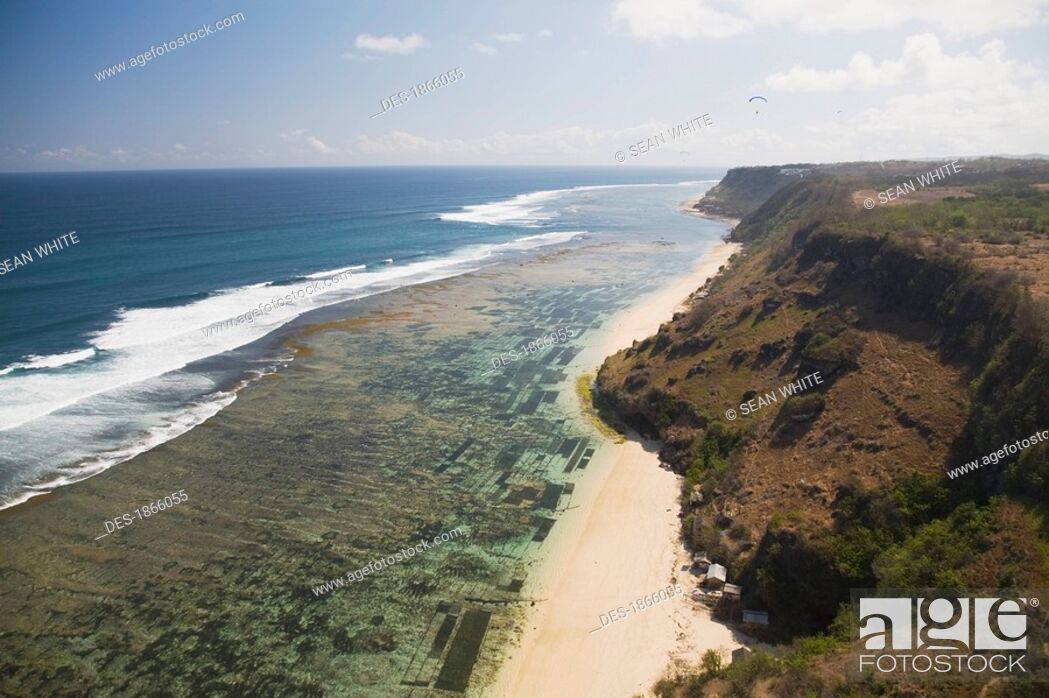 Stock Photo: Aerial view over the cliffs, reefs and beaches of the Bukit Peninsula of Bali, Indonesia.