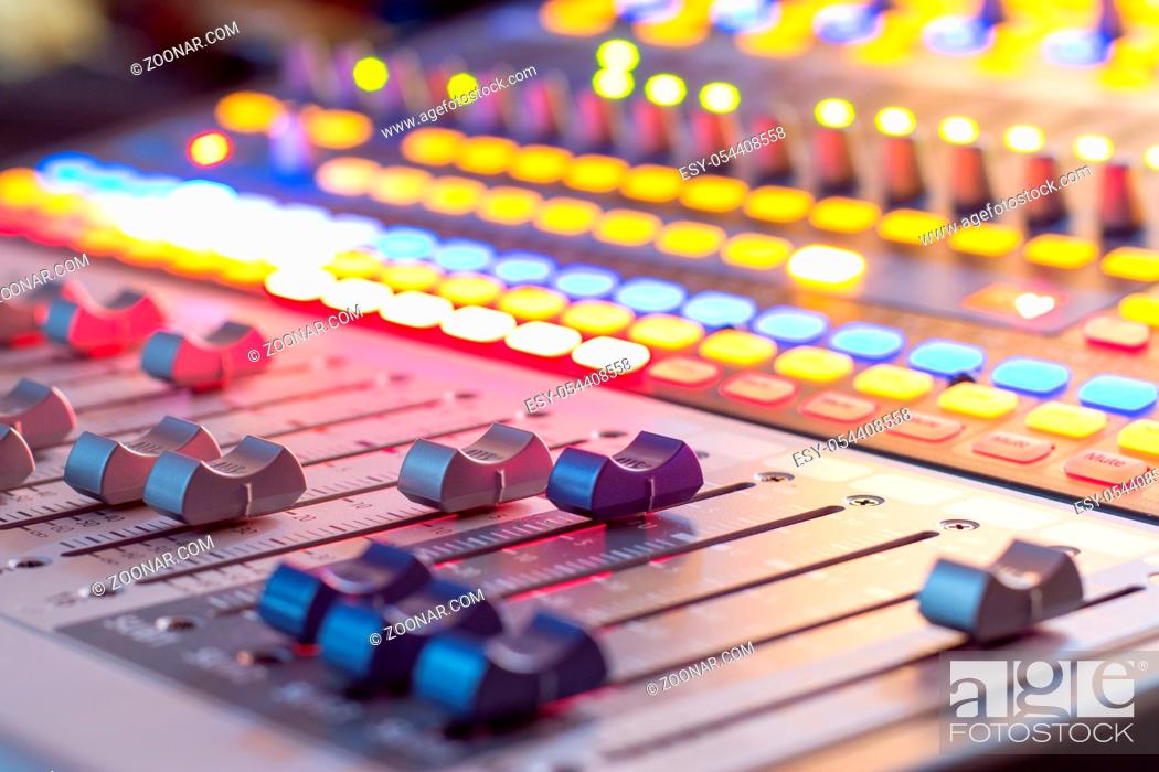 Stock Photo: Professional music production in a sound recording studio, mixer desk.