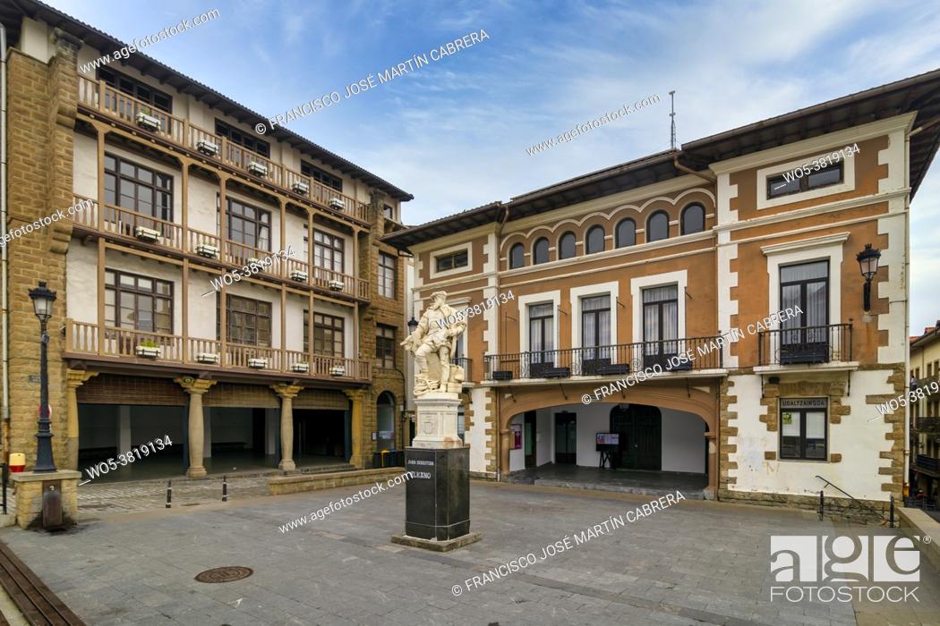 Stock Photo: Entrance square to Getaria with a sculpture of Juan Sebastian El Cano, the famous Spanish sailor.