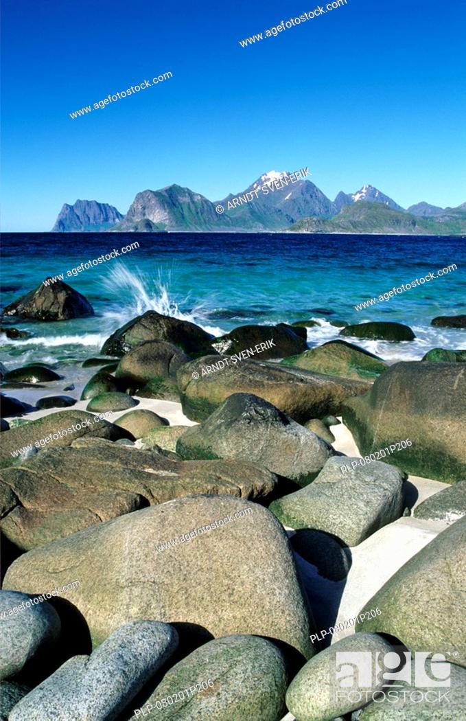 Stock Photo: Stones in the surf on the Myrland beach, Lofoten islands, Norway.