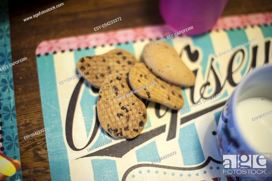 Stock Photo: Milk with breakfast biscuits.
