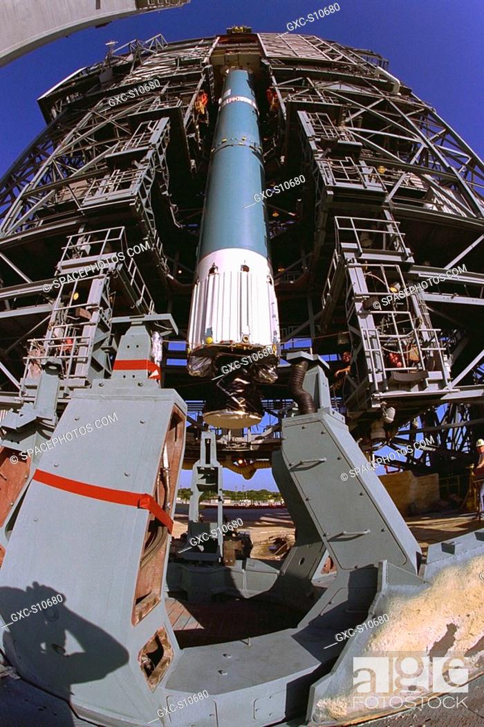 Stock Photo: 07/29/1997 --- The first stage of the Delta II rocket which will to be used to launch the Advanced Composition Explorer ACE spacecraft is erected at Launch.