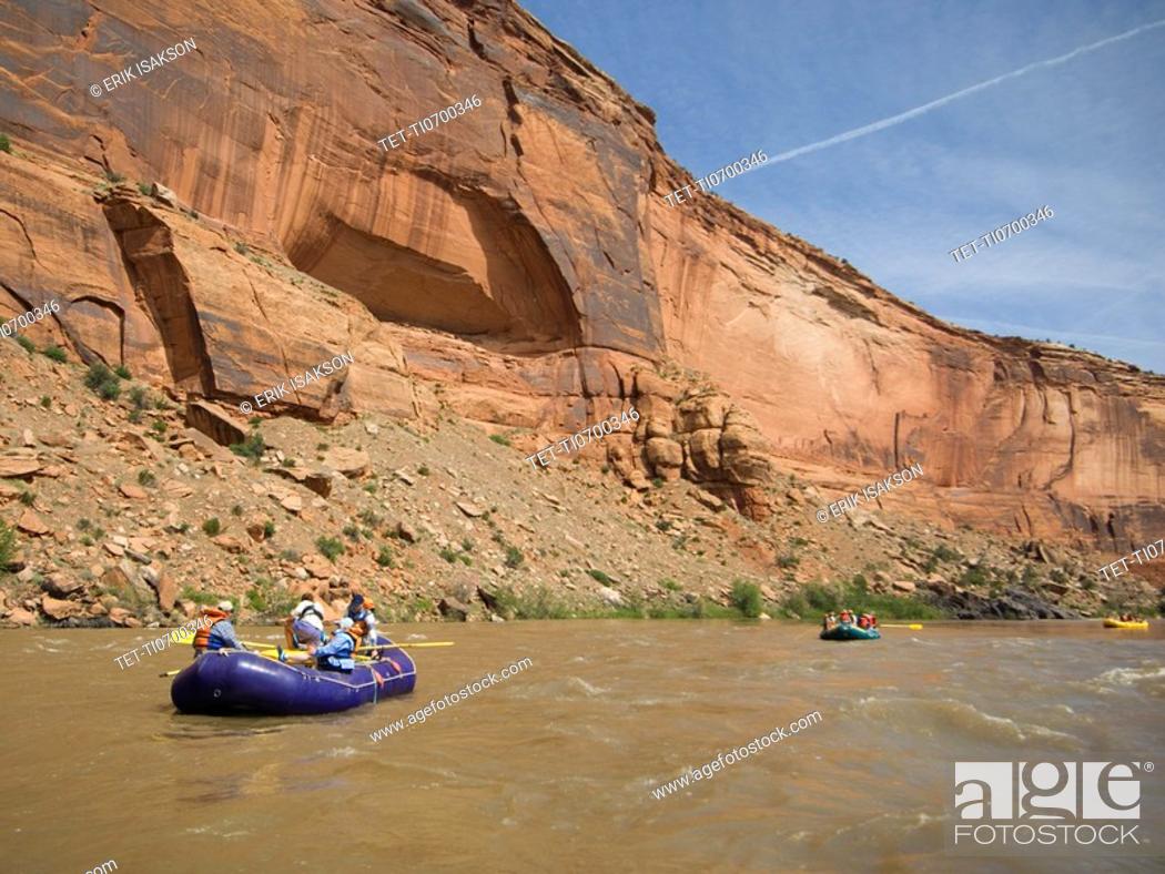 Stock Photo: Groups of people river rafting.
