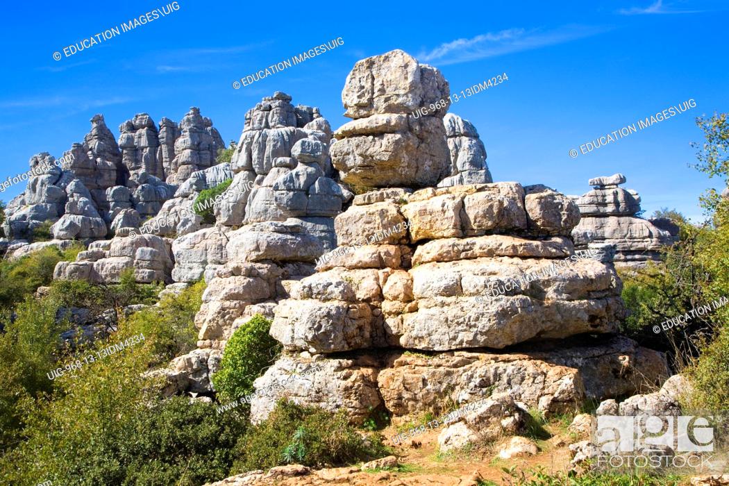 Stock Photo: Rocks shaped by erosion and weathering at El Torcal de Antequera national park, Andalusia, Spain.