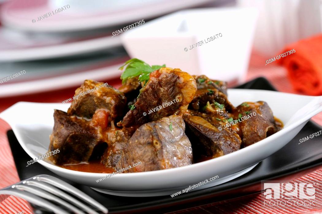 Stock Photo: Deep-fried veal heart with romesco sauce.