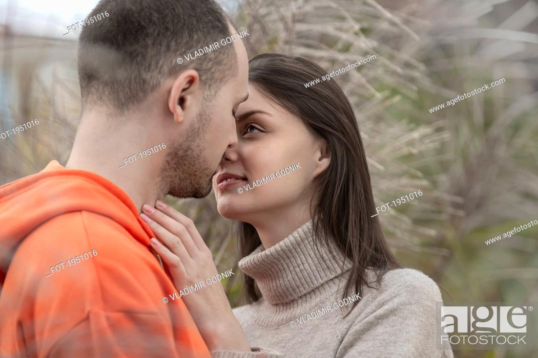 Stock Photo: Sensual, affectionate young couple kissing.