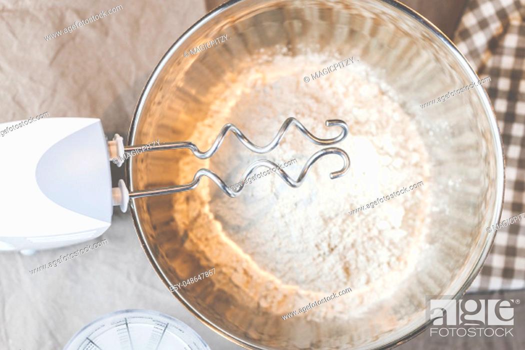 Stock Photo: Bake bread with flour, water and the dough hook of a hand mixer.