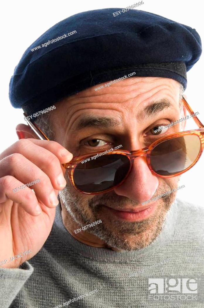 Stock Photo: aging artist thinking distorted nose close up beret hat.