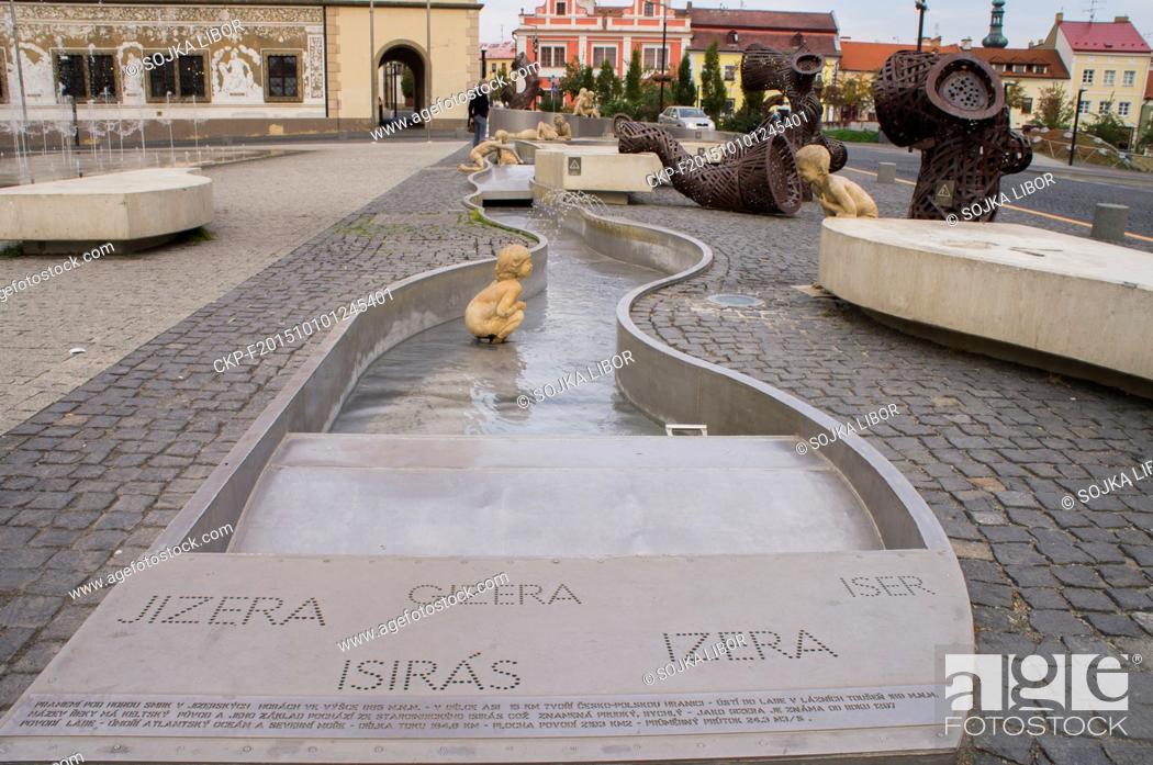 Photo de stock: The fountain, left, and water cascade featuring the Jizera (Iser, Izera) River in front of the Town Hall at Old Town Square in Mlada Boleslav, Czech Republic.