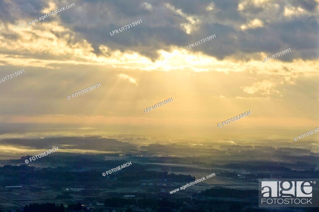 Stock Photo: Sunrise over a Town.