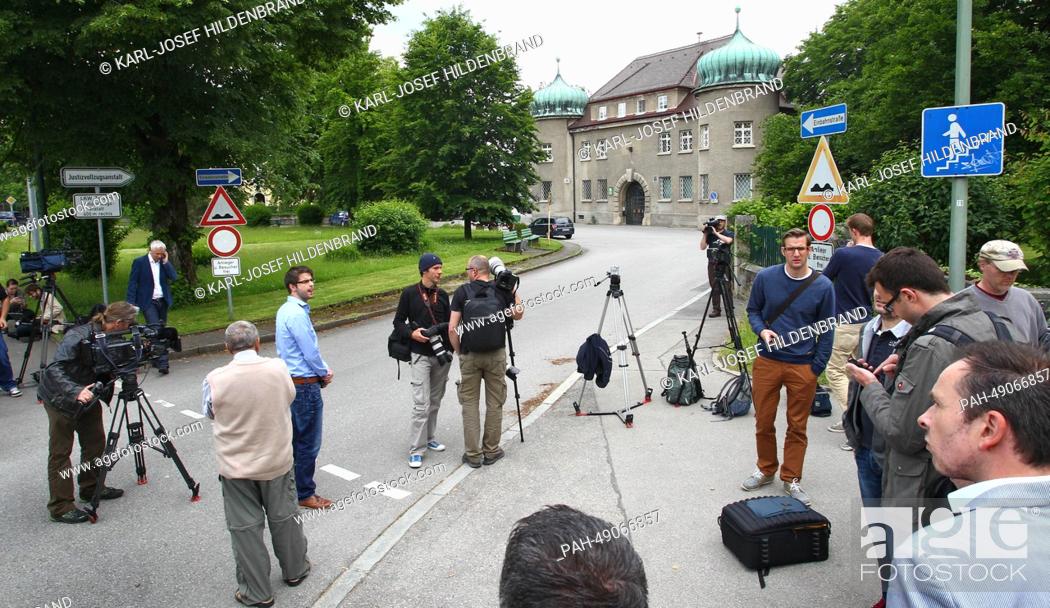 Stock Photo: People and journalists wait in front of the prison in Landsberg am Lech, Germany, 02 June 2014. According to media reports on 02 June 2014, Hoeness.