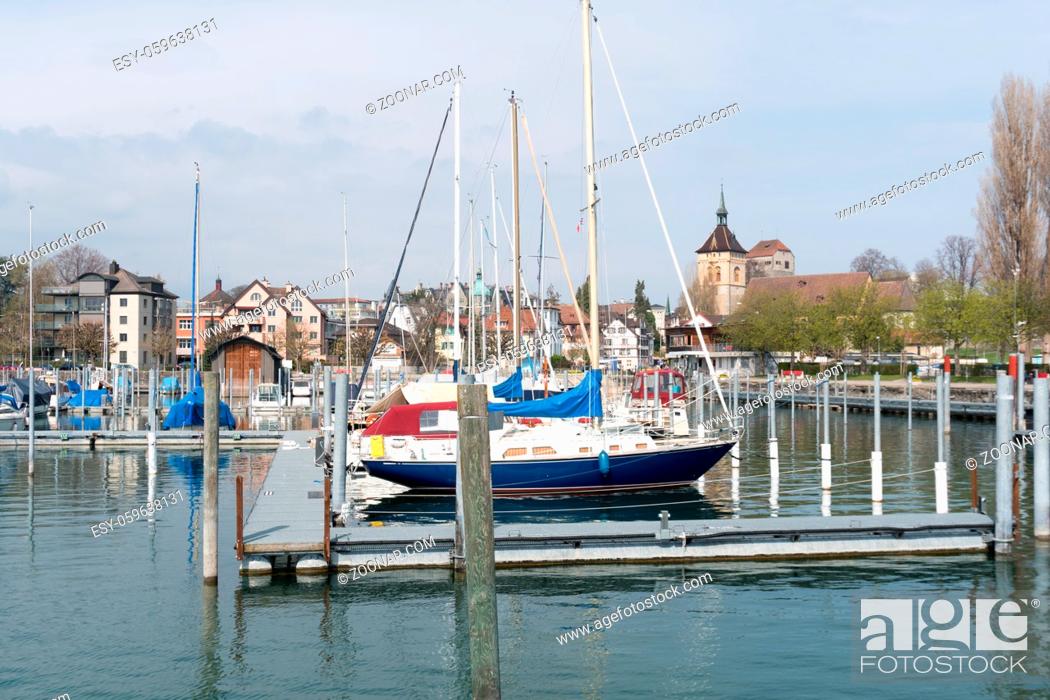 Stock Photo: Aarbon, SG / Switzerland - April 7, 2019: view of the harbor and old town of Arbon on the shores of Lake Constance in Switzerland.