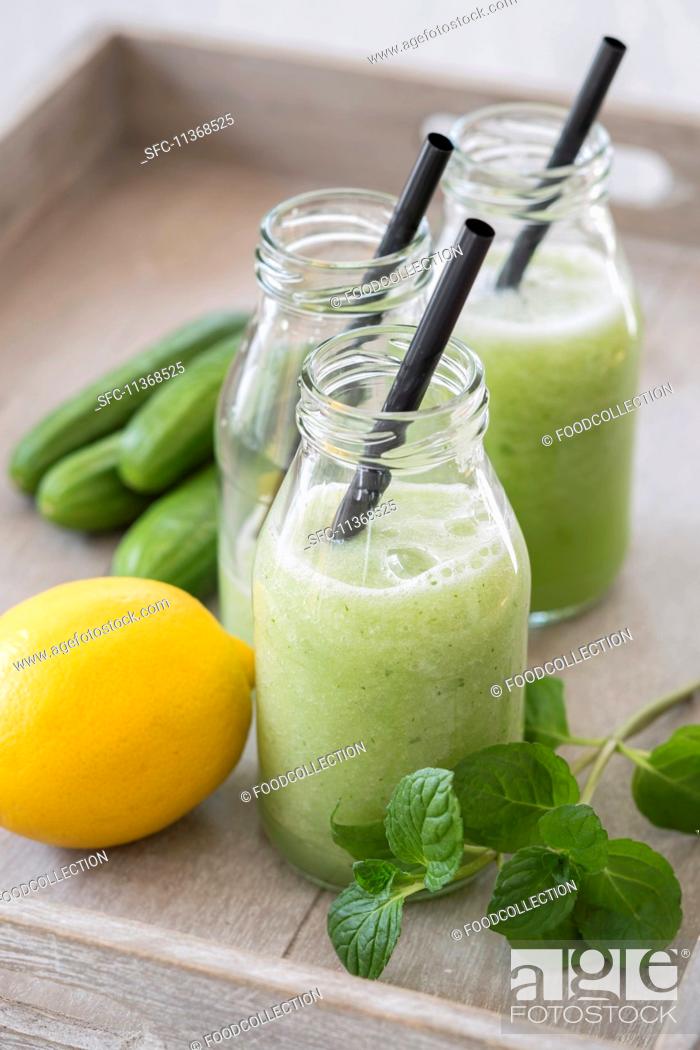 Stock Photo: Cold cucumber soup with lemon and mint.
