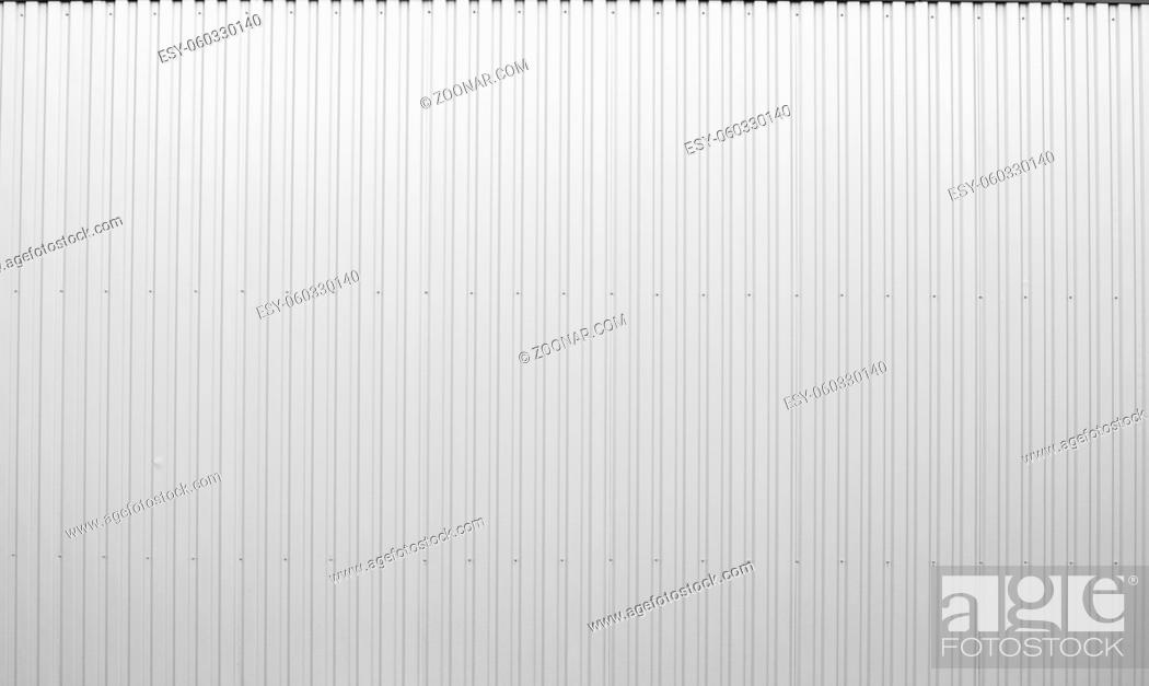 Stock Photo: White Corrugated metal sheet texture surface of the wall. Galvanize steel background.