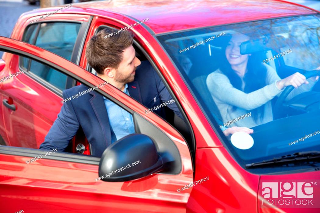 Stock Photo: Handsome Man In Suit Getting In Car.