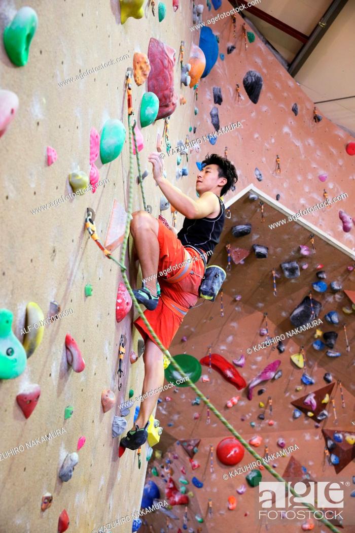 Stock Photo: Japanese climbing athlete in action.
