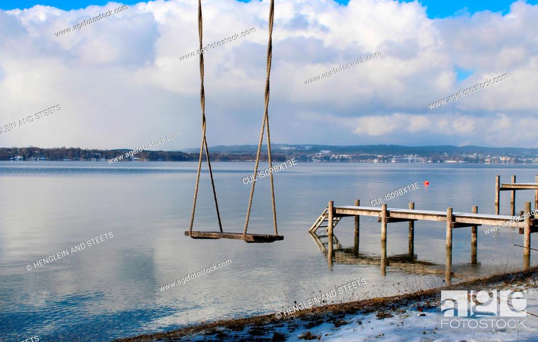 Stock Photo: Empty swing near pier, Lake Starnberg, Bavaria, Germany.
