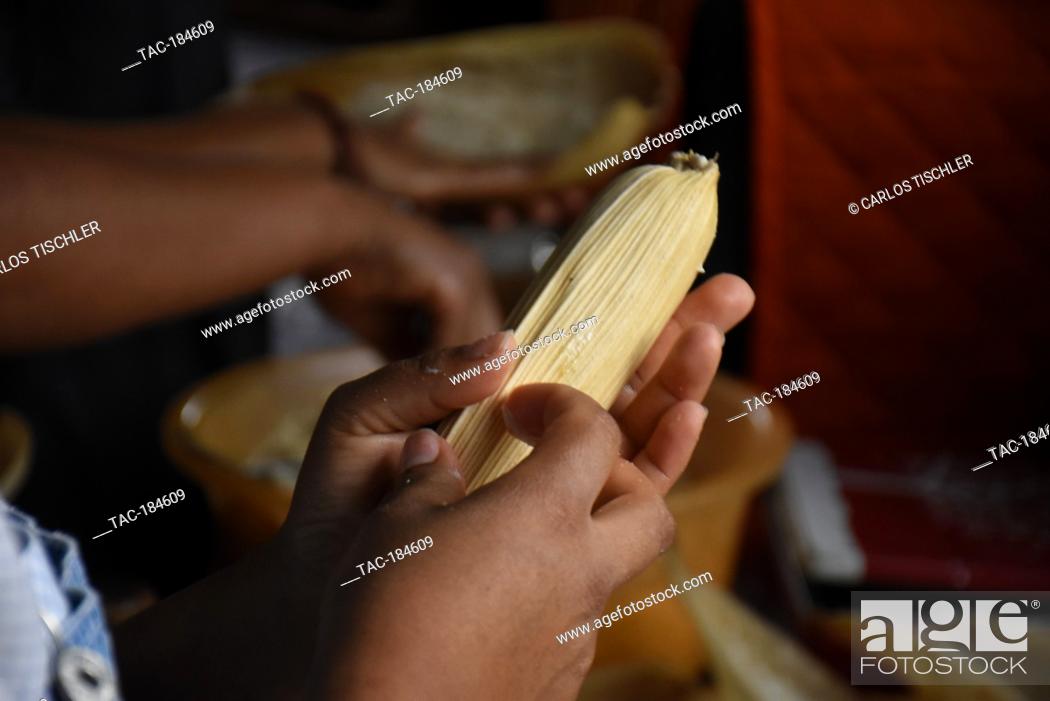 Stock Photo: TEPOZTLAN, MEXICO - JANUARY 16: Isabel's daughter prepares 'Tamales' traditional Mexican food who are cooked in this season to celebrate the candlemas day.