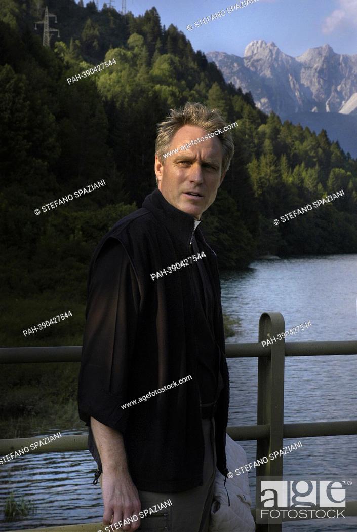 Stock Photo: Monsignor Georg Gaenswein. photo:Pope Benedict XVI walk on the banks of a river of mountain while recitation of the Rosary, of private vacations in the Dolomite.