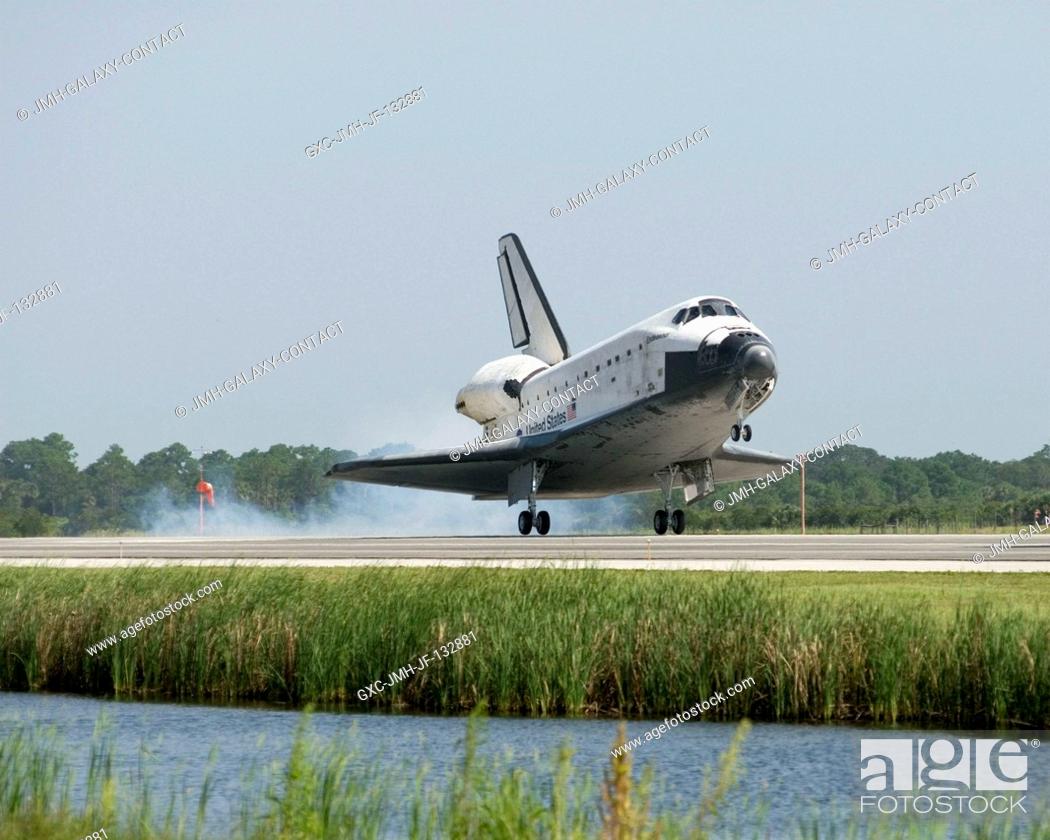 Stock Photo: Space Shuttle Endeavour touches down on landing Runway 15 of the Shuttle Landing Facility at NASA's Kennedy Space Center, concluding the 16-day, 6.