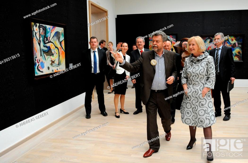 Stock Photo: Director of the Lenbachhaus Helmut Friedel (L) leads a tour of the newly renovated Lenbachhaus with German Education Minister Johanna Wanka in Munich,  Germany.