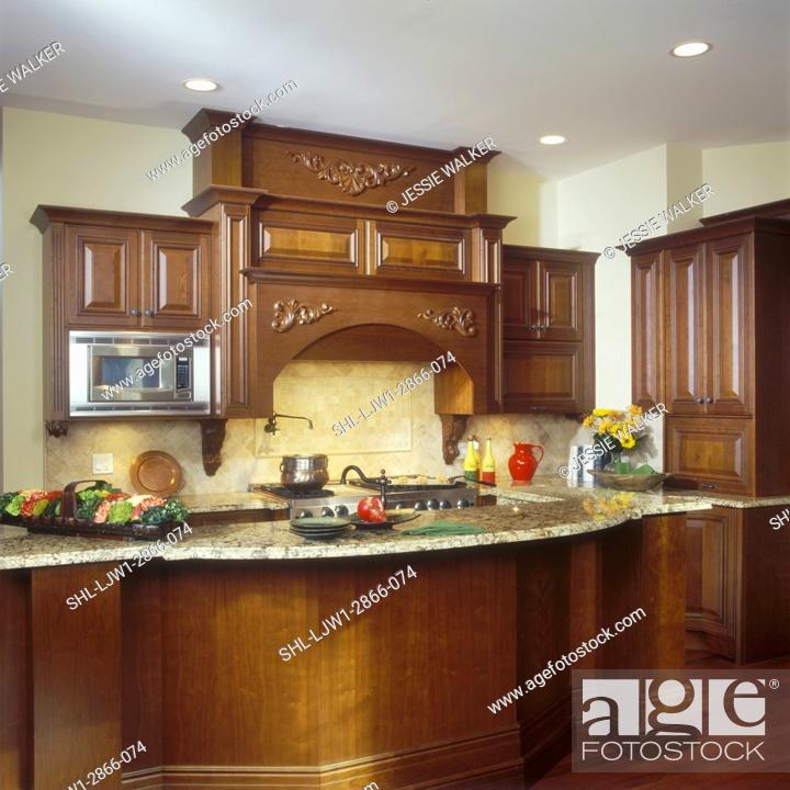 Kitchens Traditional Upscale Dark Wood Cabinets And Cream And
