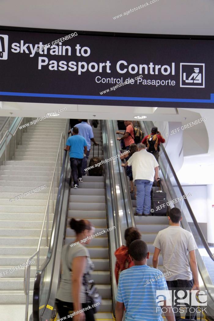 Stock Photo: Florida, Miami, Miami International Airport, MIA, arriving passengers, international flight, concourse, passport control, skytrain, escalator,.