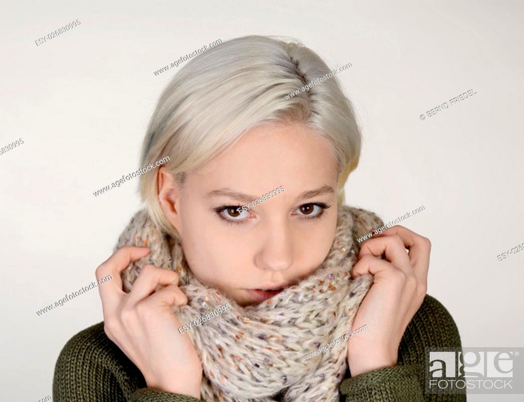 Stock Photo: young woman with scarf.