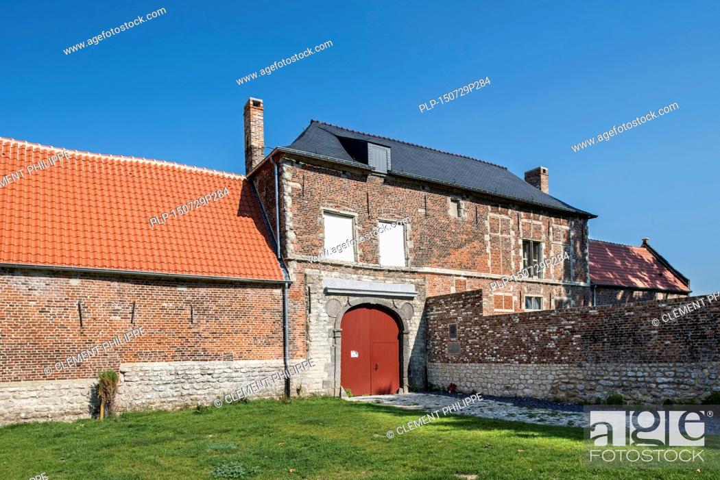 Stock Photo: Entrance gate of the renovated Château d'Hougoumont, farmhouse where British and other allied forces faced Napoleon's Army at the Battle of Waterloo on June 18.