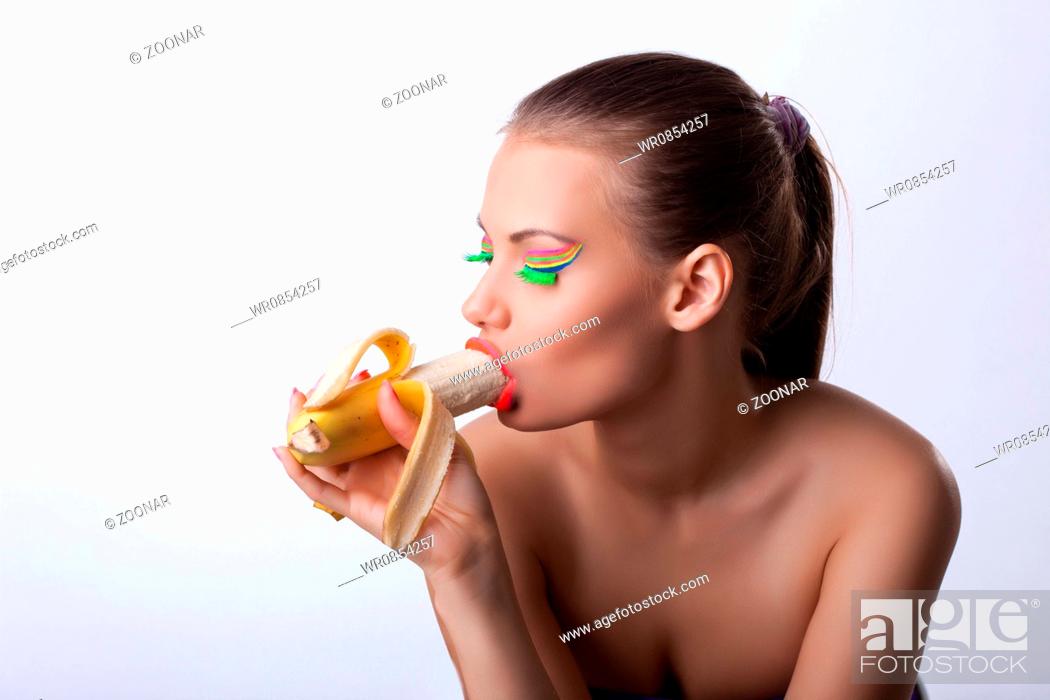 funny sexy girl eat long banana with desire, Stock Photo, Picture And  Royalty Free Image. Pic. WR0854257 | agefotostock