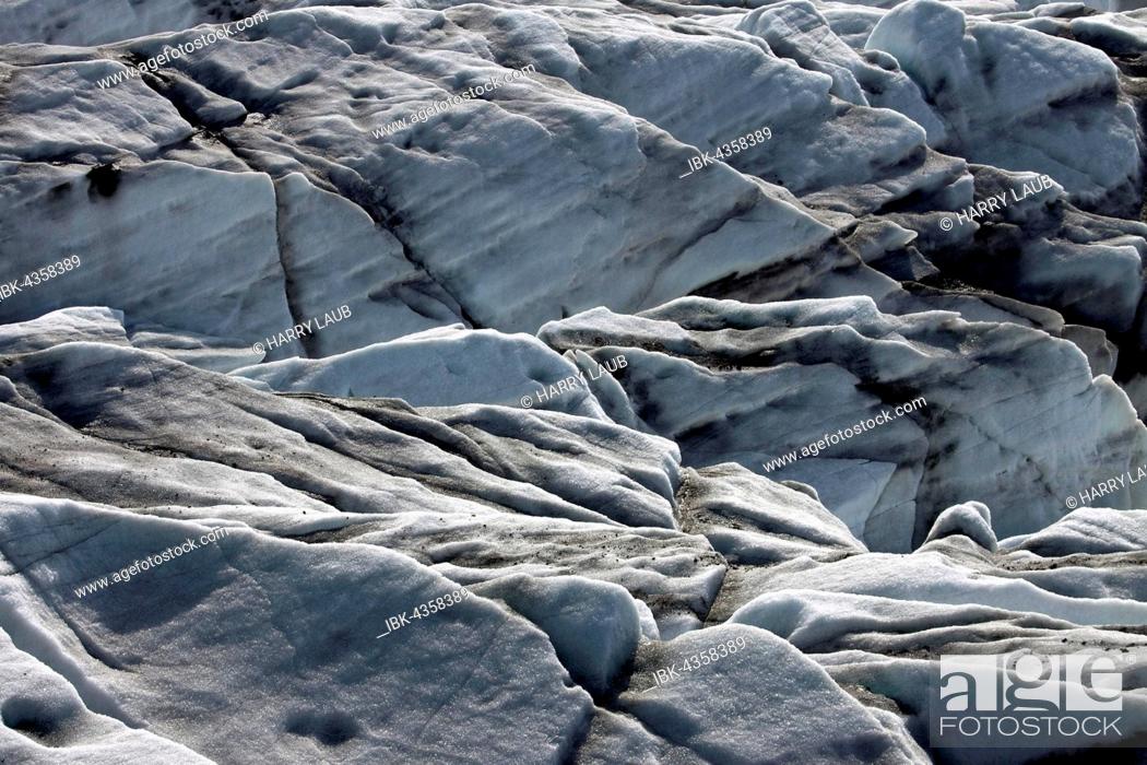 Stock Photo: Ice, glacier ice with traces of volcanic ash, icebergs at glacier Svinafellsjökull in Skaftafell, Southern Iceland, Iceland.