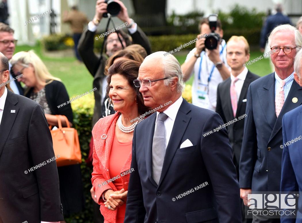Stock Photo: Swedish Queen Silvia and Swedish King Carl XVI Gustaf arriving for the 'Media Night' as part of the equestrian tournament CHIO in Aachen, Germany, 12 July 2016.
