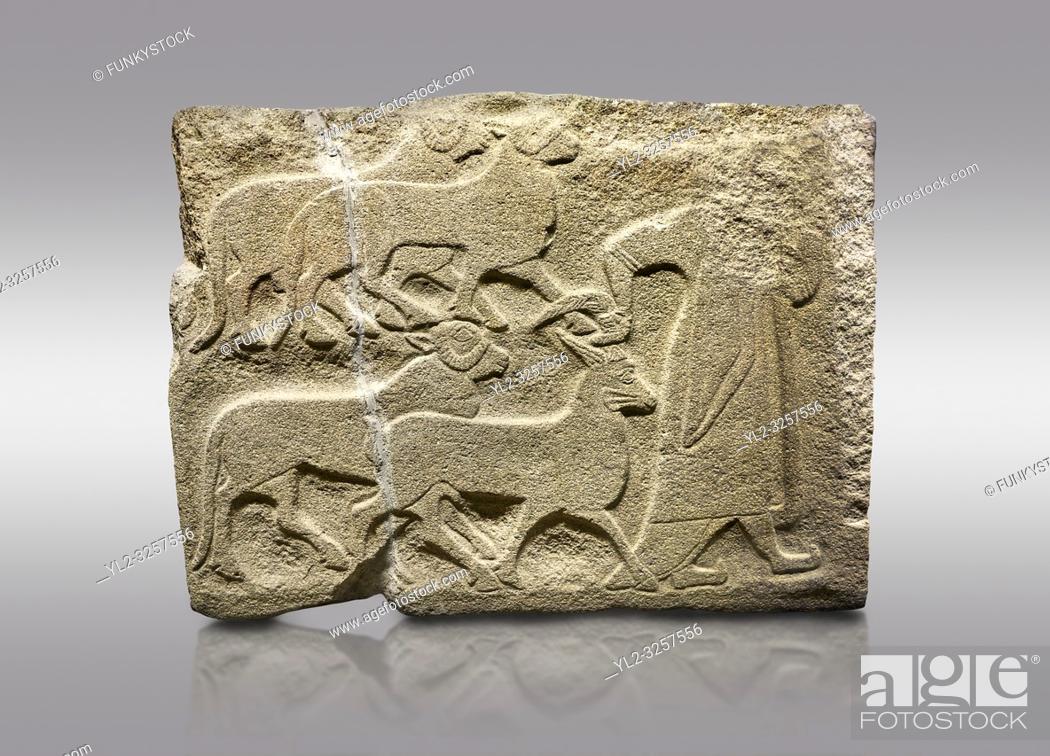 Stock Photo: Alaca Hoyuk Sphinx Gate Hittite monumental relief sculpted orthostat stone panel. A figure bringing sacrificial animals. Anatolian Civilizations Museum, Ankara.