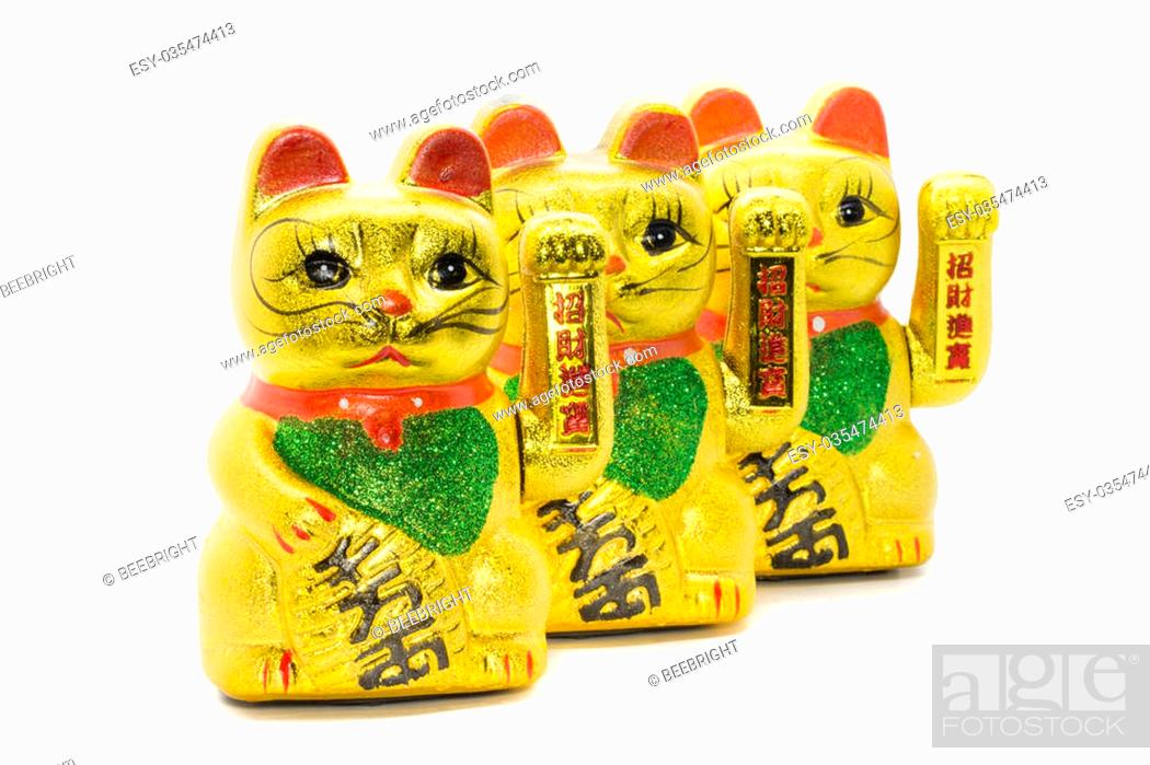 Stock Photo: Row of Maneki neko lucky chinese, japanese waving cat.