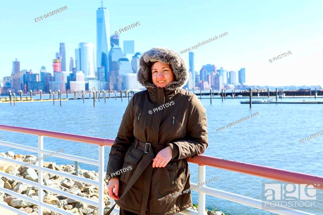Stock Photo: beautiful woman in the background in New York Beautiful american girl in area with Manhattan view.