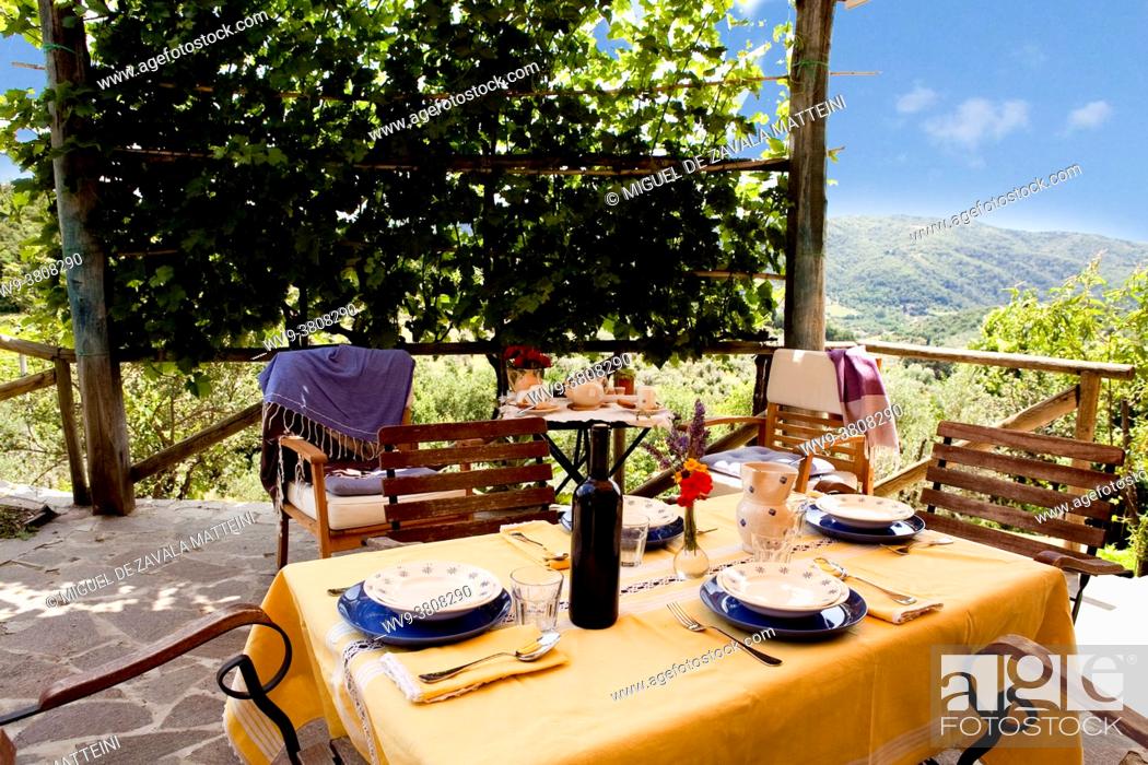 Stock Photo: A lunch table finely set outdoors in a Chianti Terrace.