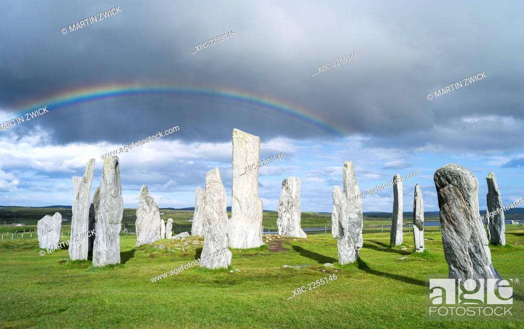 Stock Photo: Standing Stones of Callanish (Callanish 1) on the Isle of Lewis in the Outer Hebrides. The megalithic monument is cross shaped with a central ring of stones and.