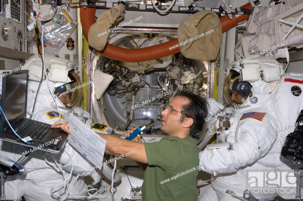 Stock Photo: NASA astronaut Joe Acaba (center), Japan Aerospace Exploration Agency astronaut Aki Hoshide (left) and NASA astronaut Sunita Williams.