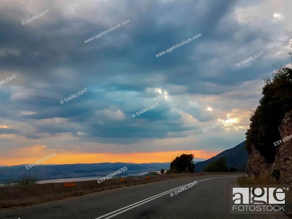Stock Photo: ioannina from mitsikeli mountain road in evening colors greece.